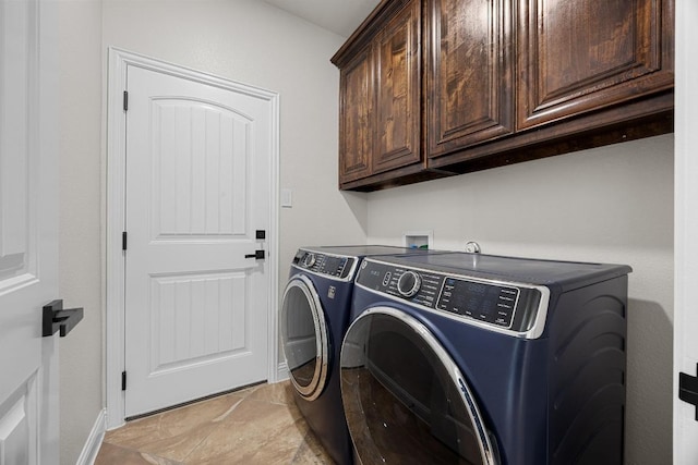 100 Crystal Cv, Round Rock, TX 78664 - laundry area with cabinet space, washer and clothes dryer, and light stone finish floors