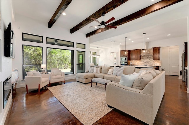 2471 George Pass, Canyon Lake, TX 78133 - living room with concrete flooring, a ceiling fan, beamed ceiling, and recessed lighting
