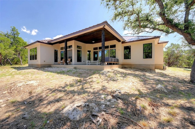 2471 George Pass, Canyon Lake, TX 78133 - back of property with stucco siding and a metal roof