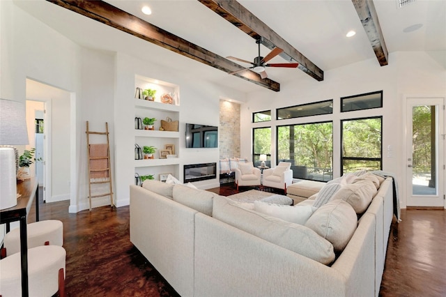 2471 George Pass, Canyon Lake, TX 78133 - living area featuring built in features, ceiling fan, beam ceiling, concrete flooring, and recessed lighting