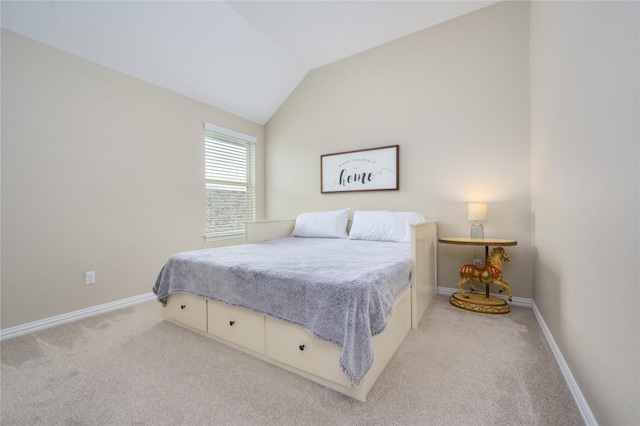 5612 Wild Foxglove Rd, Spicewood, TX 78669 - bedroom featuring light colored carpet and vaulted ceiling