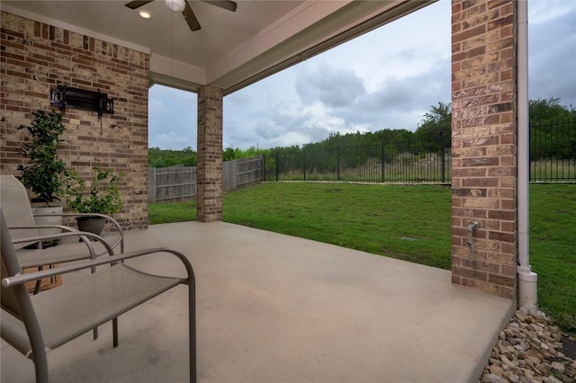 5612 Wild Foxglove Rd, Spicewood, TX 78669 - fenced backyard with a ceiling fan and a patio area