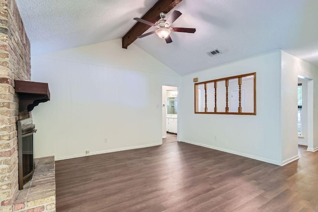 2112 Cindy Ln, Austin, TX 78727 - unfurnished living room featuring a fireplace, wood finished floors, ceiling fan, and a textured ceiling