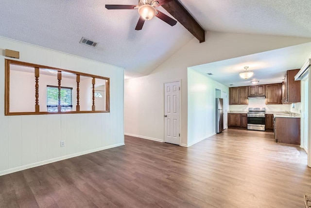 2112 Cindy Ln, Austin, TX 78727 - unfurnished living room featuring wood finished floors, ceiling fan, and a textured ceiling