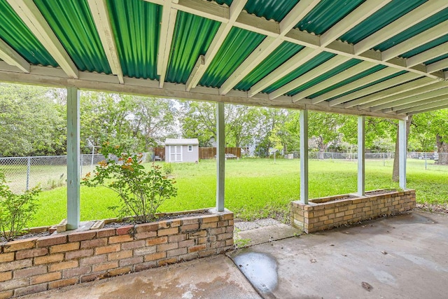 2112 Cindy Ln, Austin, TX 78727 - fenced backyard with a storage shed and a patio
