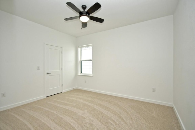 7601 Cooper Ln Unit 25, Austin, TX 78745 - unfurnished room featuring light colored carpet and ceiling fan