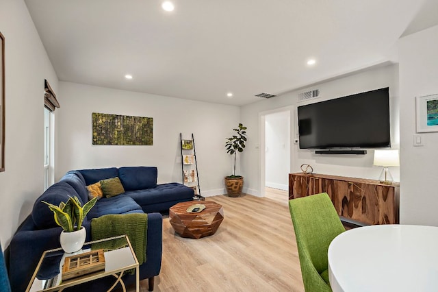 1206 Hollow Creek Dr Unit 3, Austin, TX 78704 - living area with wood finished floors and recessed lighting