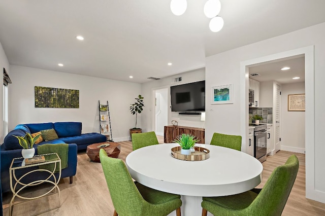 1206 Hollow Creek Dr Unit 3, Austin, TX 78704 - dining area featuring light wood-type flooring and recessed lighting