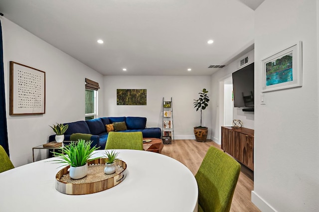 1206 Hollow Creek Dr Unit 3, Austin, TX 78704 - dining area featuring light wood-style flooring and recessed lighting