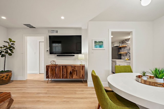 1206 Hollow Creek Dr Unit 3, Austin, TX 78704 - living area with light wood-type flooring and recessed lighting