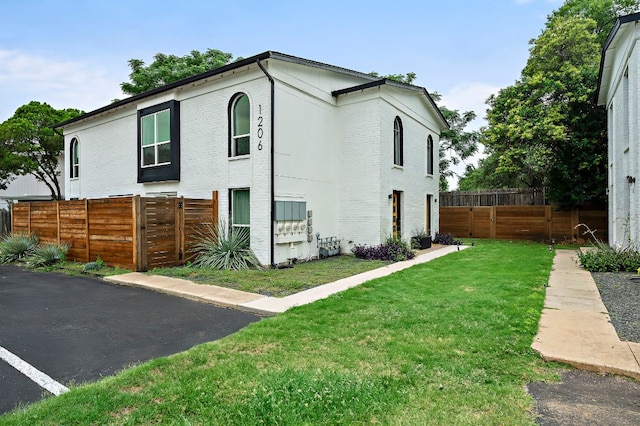 1206 Hollow Creek Dr Unit 3, Austin, TX 78704 - view of property exterior featuring brick siding