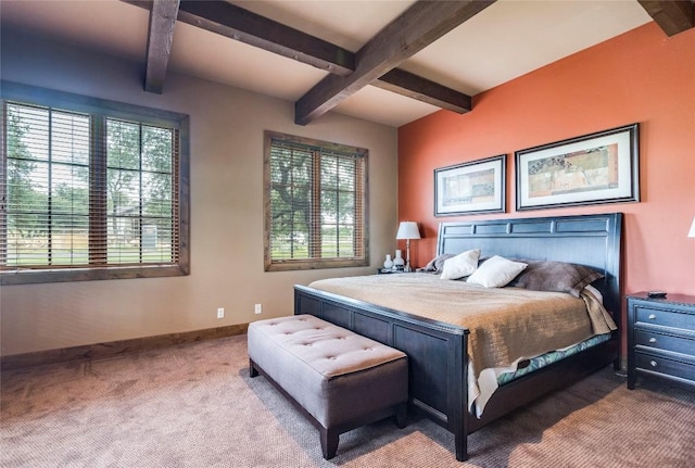 171 Oak Grove Cv, Georgetown, TX 78628 - carpeted bedroom with beam ceiling