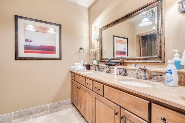 171 Oak Grove Cv, Georgetown, TX 78628 - full bath with double vanity and baseboards