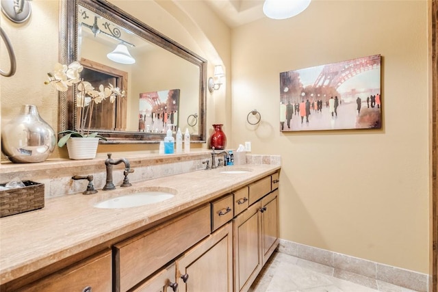 171 Oak Grove Cv, Georgetown, TX 78628 - full bathroom with double vanity and tile patterned flooring