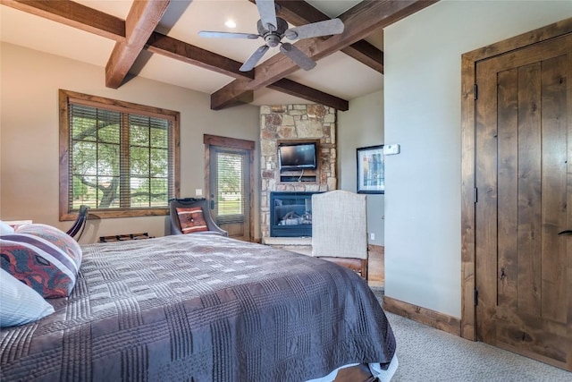 171 Oak Grove Cv, Georgetown, TX 78628 - carpeted bedroom featuring beam ceiling, coffered ceiling, a fireplace, and a ceiling fan