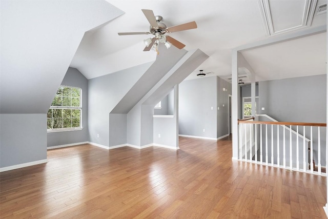 908 Golden Palomino Ct, Austin, TX 78732 - additional living space with a ceiling fan, attic access, light wood-style flooring, and vaulted ceiling