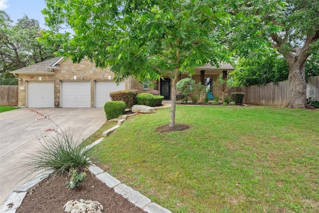 908 Golden Palomino Ct, Austin, TX 78732 - obstructed view of property with driveway, a garage, and stone siding