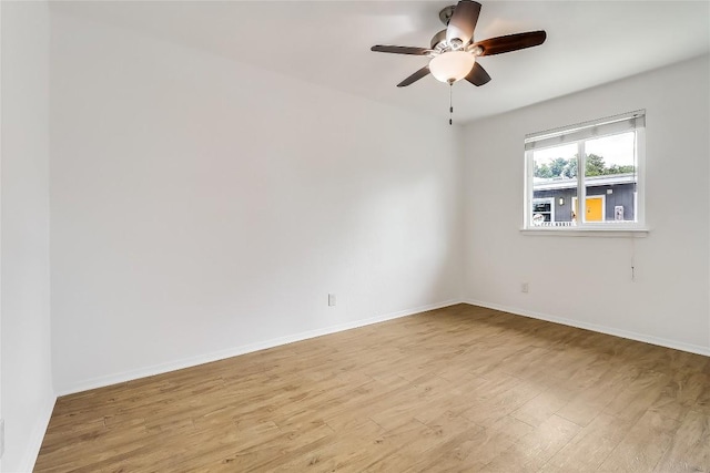 2401 Manor Rd Unit 210, Austin, TX 78722 - spare room featuring light wood-style floors and a ceiling fan