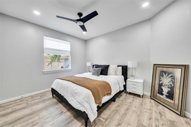 203 Sailors Run, Lakeway, TX 78734 - bedroom with light wood-style flooring, recessed lighting, and a ceiling fan