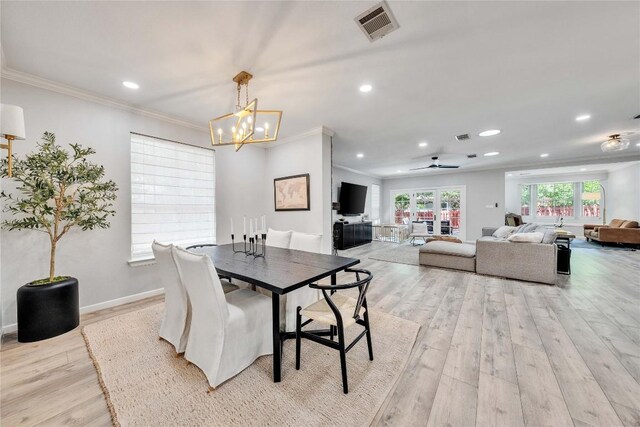 203 Sailors Run, Lakeway, TX 78734 - dining room with light wood finished floors, recessed lighting, a chandelier, and ornamental molding