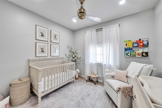 203 Sailors Run, Lakeway, TX 78734 - bedroom with a nursery area, wood finished floors, ceiling fan, and recessed lighting