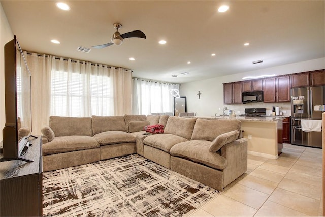 417 Epiphany Ln, Pflugerville, TX 78660 - living area with a ceiling fan, recessed lighting, and light tile patterned flooring