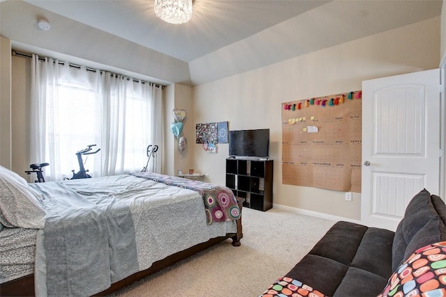 417 Epiphany Ln, Pflugerville, TX 78660 - carpeted bedroom with a chandelier and baseboards