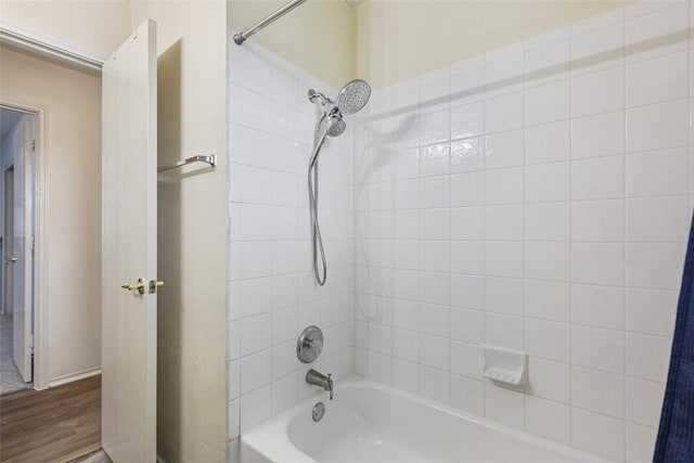 17737 Golden Valley Dr, Manor, TX 78653 - bathroom with shower / bathtub combination with curtain and wood finished floors