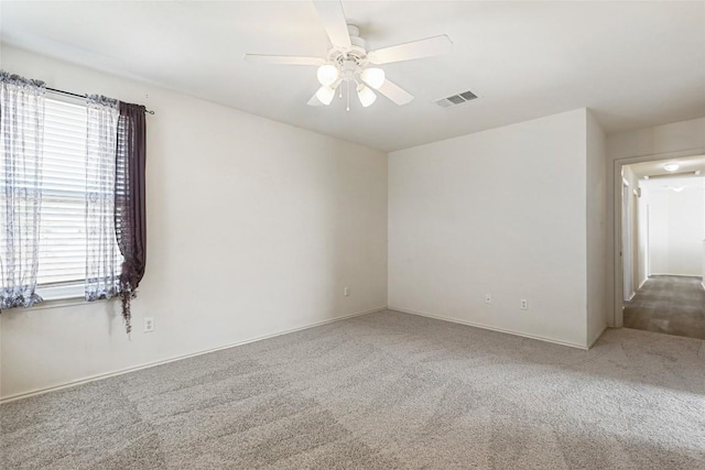 17737 Golden Valley Dr, Manor, TX 78653 - carpeted spare room featuring a ceiling fan and baseboards