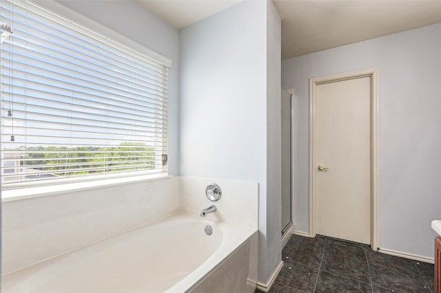 17737 Golden Valley Dr, Manor, TX 78653 - bathroom with a bath, a shower stall, and vanity