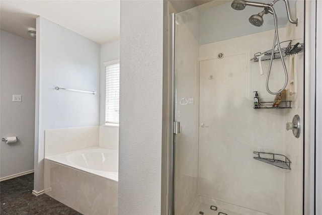 17737 Golden Valley Dr, Manor, TX 78653 - full bathroom featuring a stall shower and a garden tub