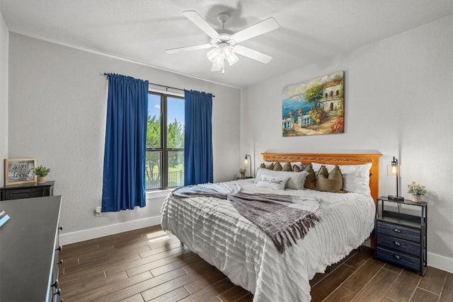 205 Honey Locust Cv, Leander, TX 78641 - bedroom with dark wood finished floors and a ceiling fan