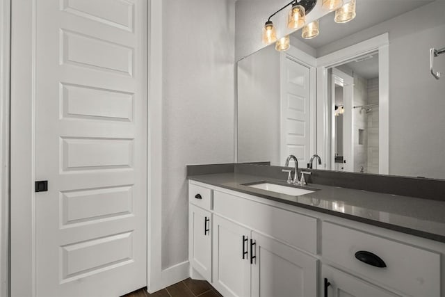 205 Honey Locust Cv, Leander, TX 78641 - bathroom with vanity, a shower, and wood finished floors