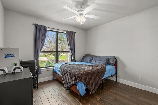 205 Honey Locust Cv, Leander, TX 78641 - bedroom featuring wood finished floors, an office area, and a ceiling fan