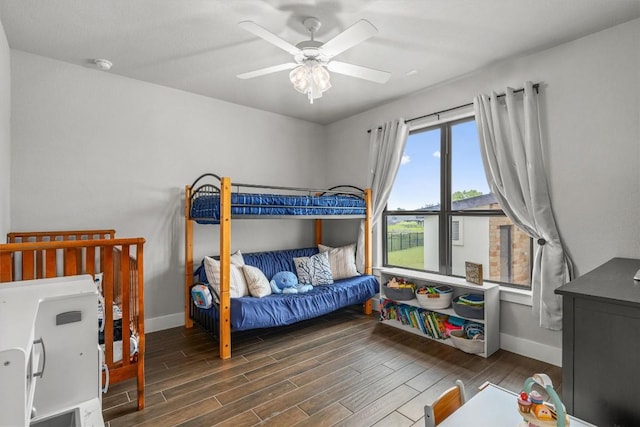 205 Honey Locust Cv, Leander, TX 78641 - bedroom with wood finished floors and a ceiling fan