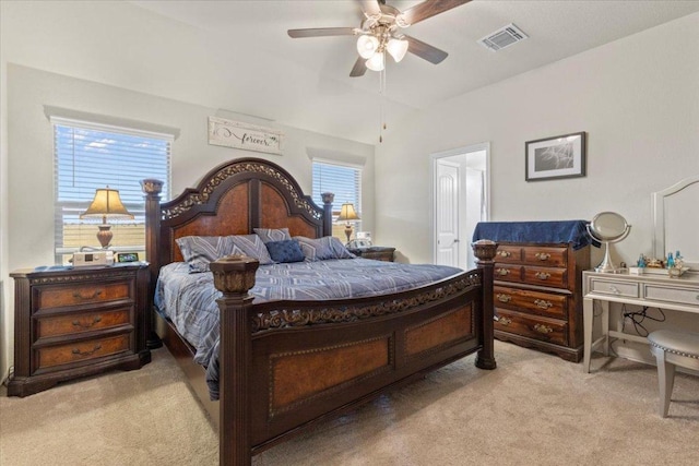 212 Plata Ln, Jarrell, TX 76537 - bedroom featuring light carpet, lofted ceiling, and a ceiling fan