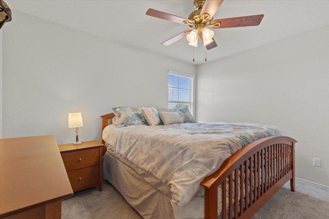 212 Plata Ln, Jarrell, TX 76537 - bedroom with light carpet and ceiling fan