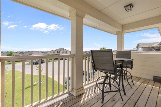 212 Plata Ln, Jarrell, TX 76537 - wooden deck featuring a residential view and a lawn
