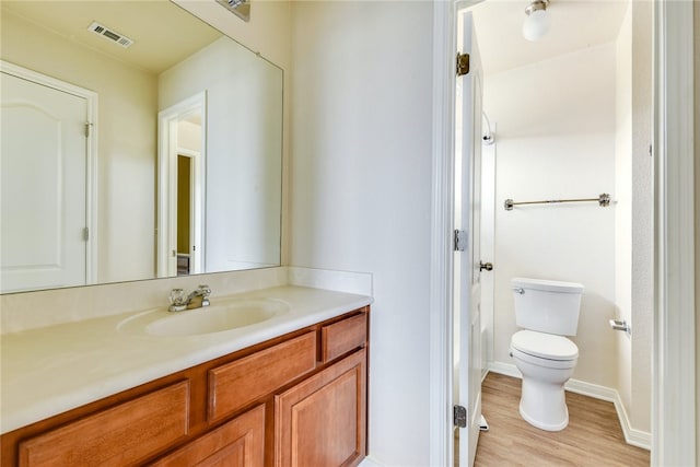 903 Fork Ridge Path, Round Rock, TX 78665 - bathroom featuring vanity and wood finished floors
