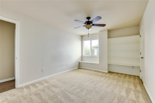 903 Fork Ridge Path, Round Rock, TX 78665 - empty room featuring carpet floors and a ceiling fan