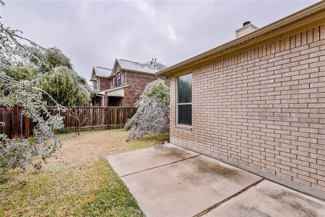 903 Fork Ridge Path, Round Rock, TX 78665 - fenced backyard featuring a patio