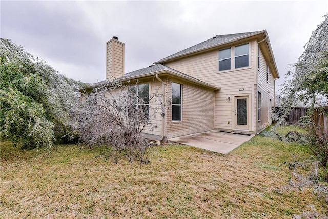 903 Fork Ridge Path, Round Rock, TX 78665 - back of property featuring a patio and a chimney