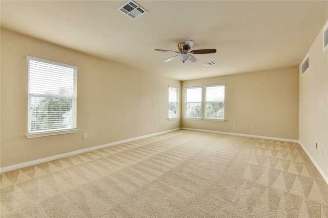 903 Fork Ridge Path, Round Rock, TX 78665 - empty room featuring light carpet and a ceiling fan