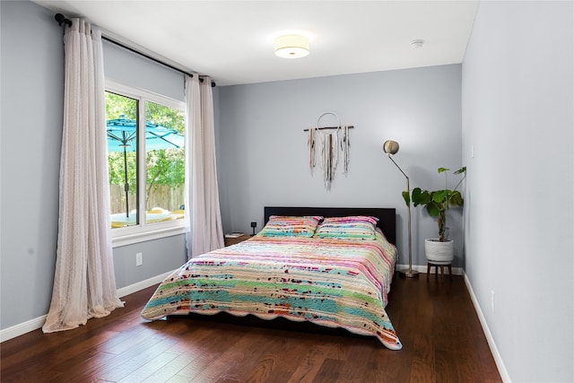 1703 Duke Ave, Austin, TX 78757 - bedroom featuring wood finished floors