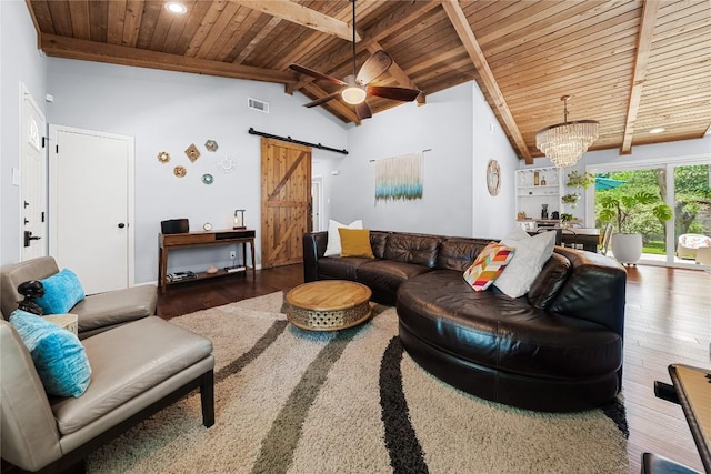 1703 Duke Ave, Austin, TX 78757 - living room featuring a barn door, wooden ceiling, wood finished floors, a chandelier, and ceiling fan