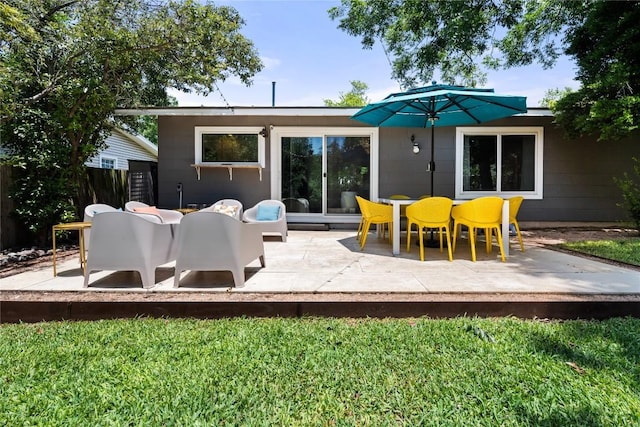 1703 Duke Ave, Austin, TX 78757 - back of property featuring a patio