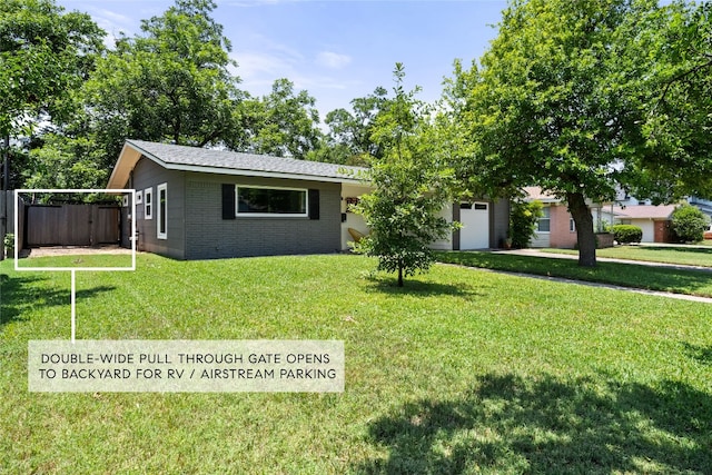 1703 Duke Ave, Austin, TX 78757 - view of front of home with a garage