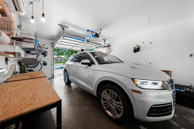 1703 Duke Ave, Austin, TX 78757 - garage featuring a garage door opener