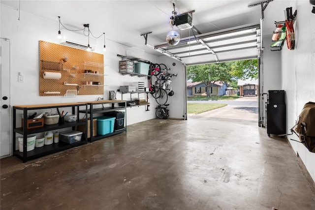 1703 Duke Ave, Austin, TX 78757 - garage featuring a garage door opener