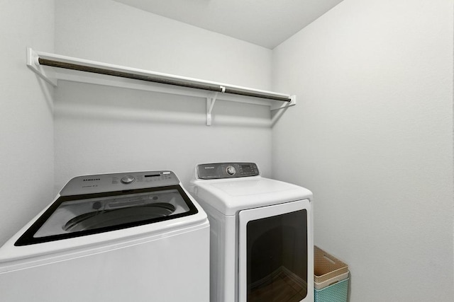 7202 Redding Dr Unit 203, Austin, TX 78745 - washroom featuring washing machine and clothes dryer